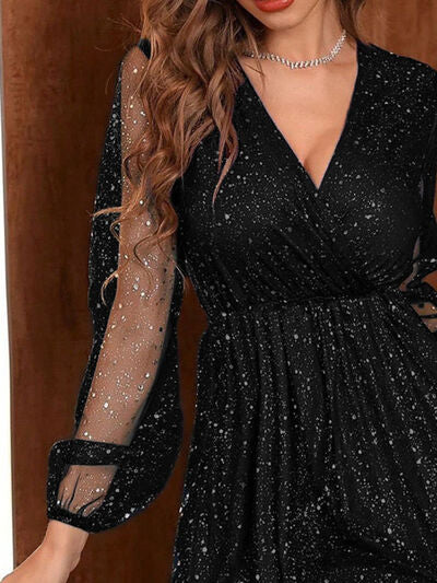 Women's black velvet cocktail dress with a-line silhouette