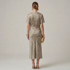 Women's printed midi dress with deep v-neck and front tie detail