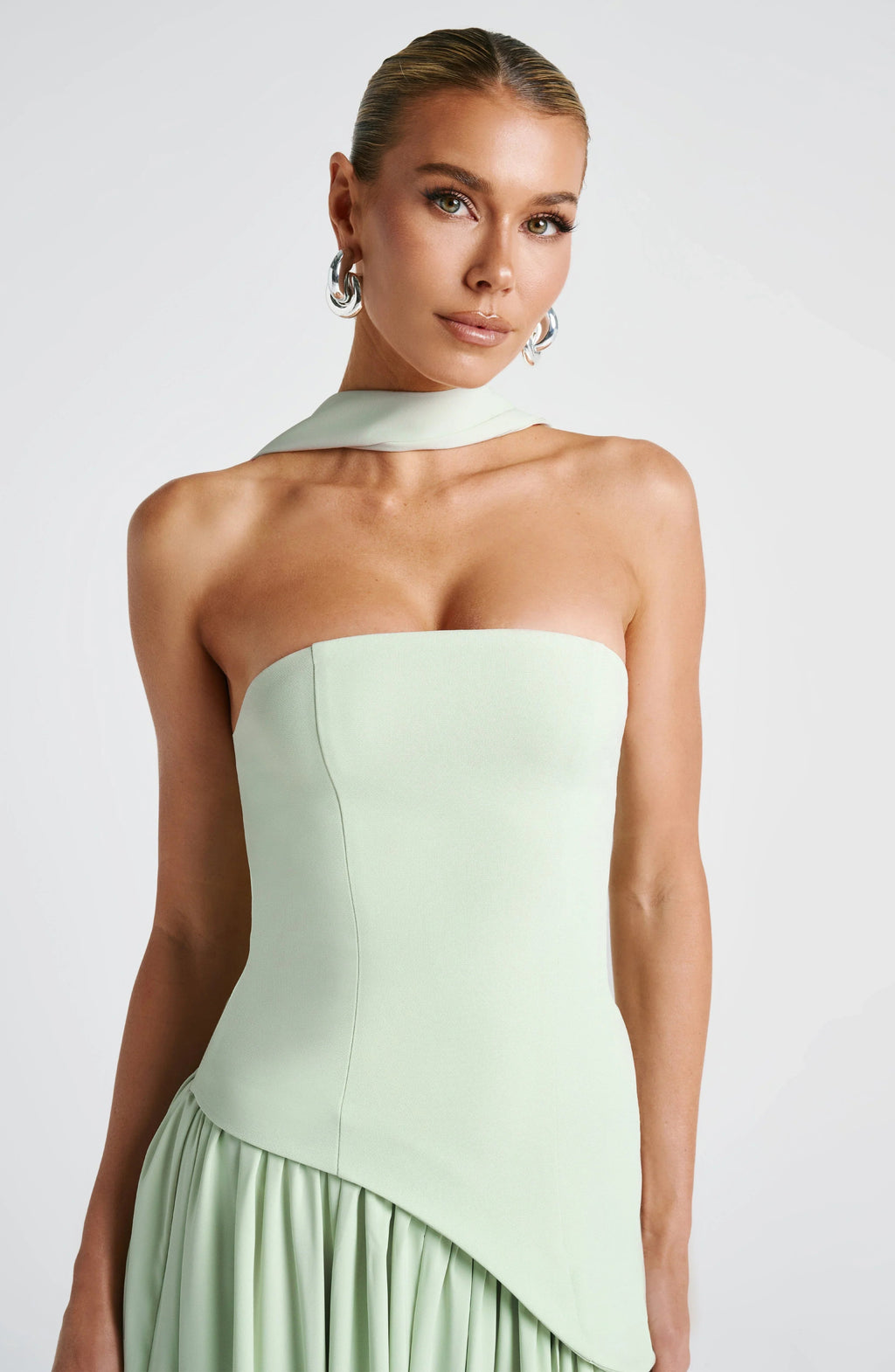 Women's light green strapless maxi dress with side slit and scarf detail