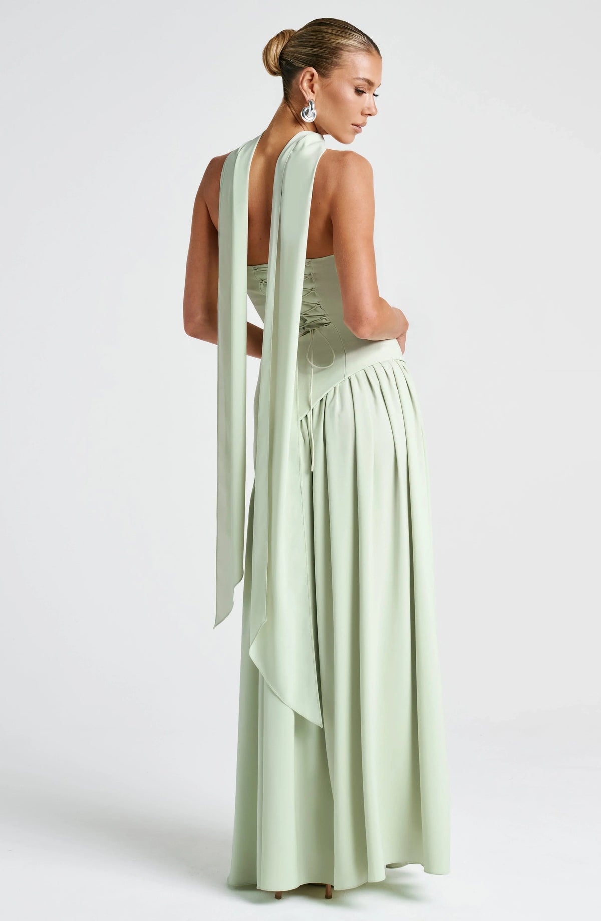 Women's light green strapless maxi dress with side slit and scarf detail