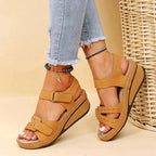 Women's black walking sandals with adjustable twin straps and flat footbed