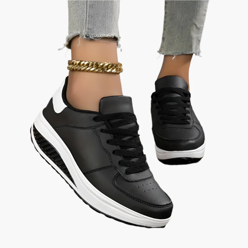 Women's black comfort sneakers with air cushion sole and lace-up upper