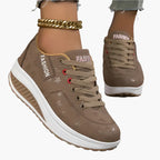Women's black comfort sneakers with air cushion sole and lace-up upper