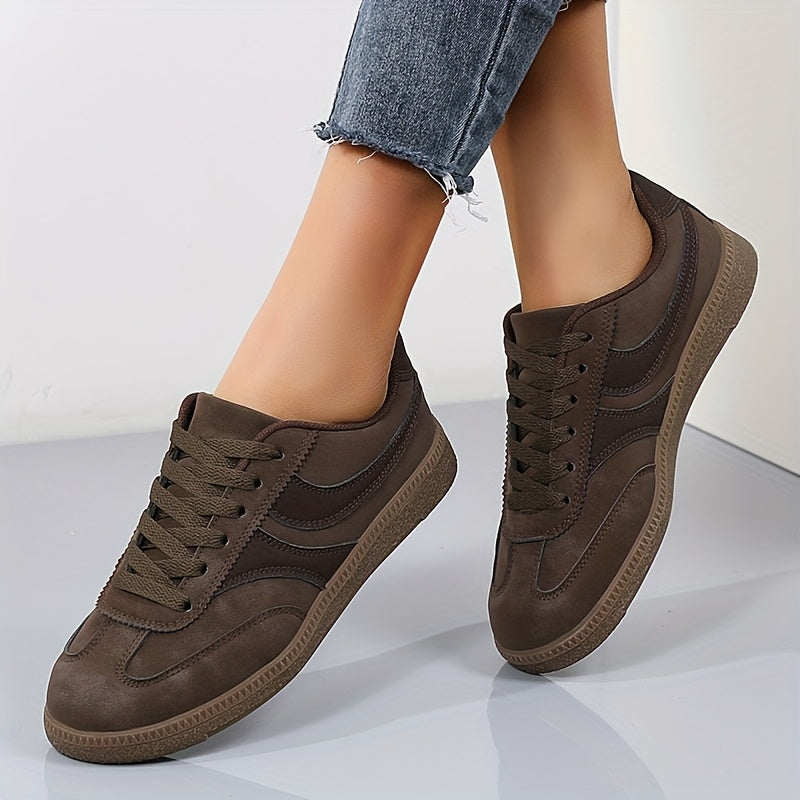 Women's brown retro low top sneakers with vintage style upper