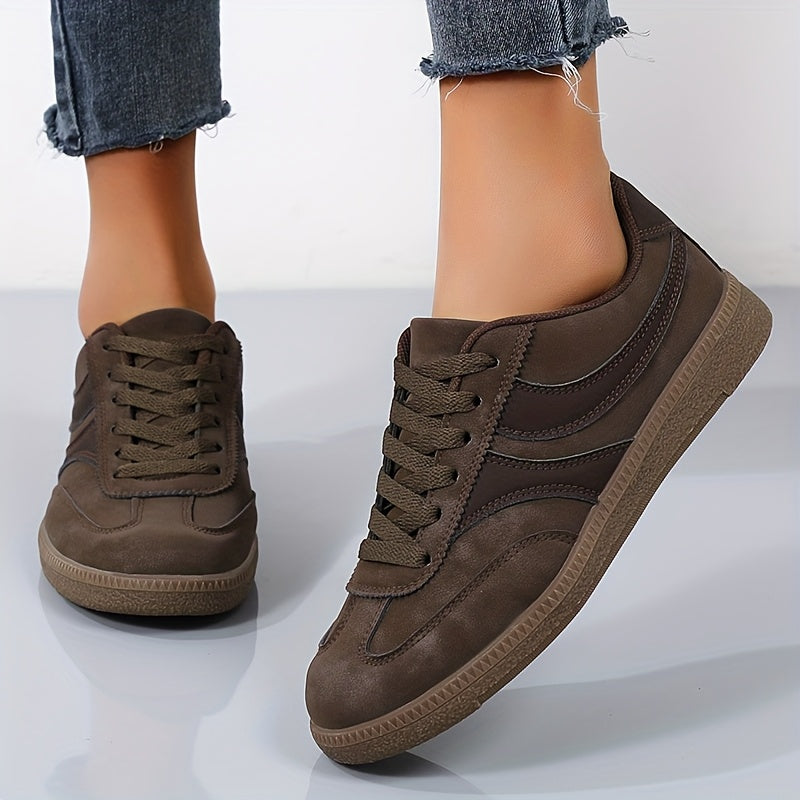 Women's brown retro low top sneakers with vintage style upper