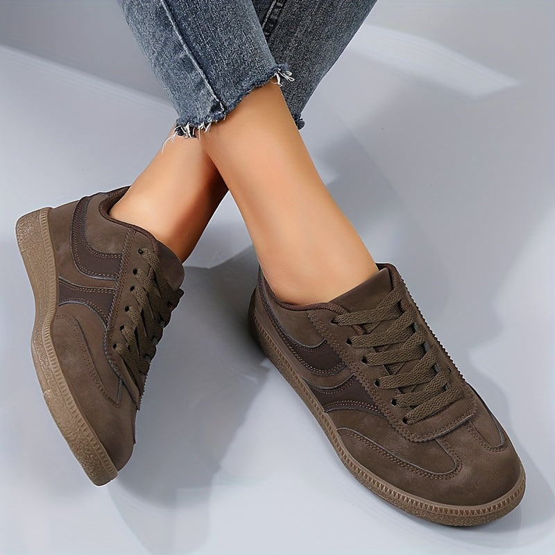 Women's brown retro low top sneakers with vintage style upper