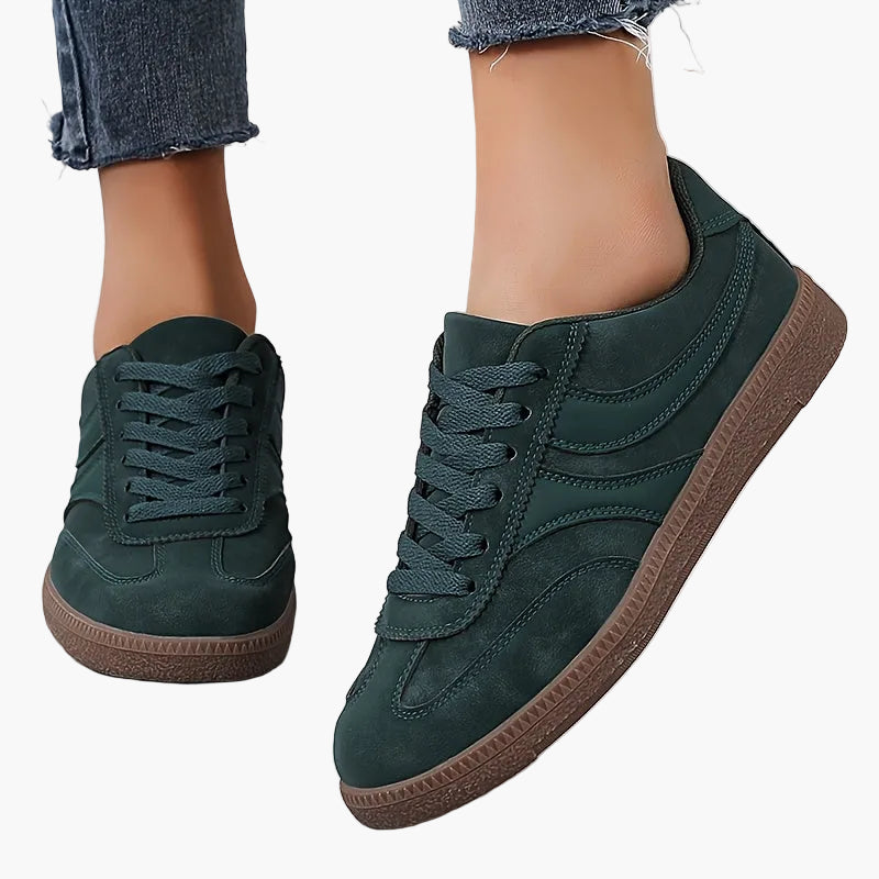 Women's brown retro low top sneakers with vintage style upper